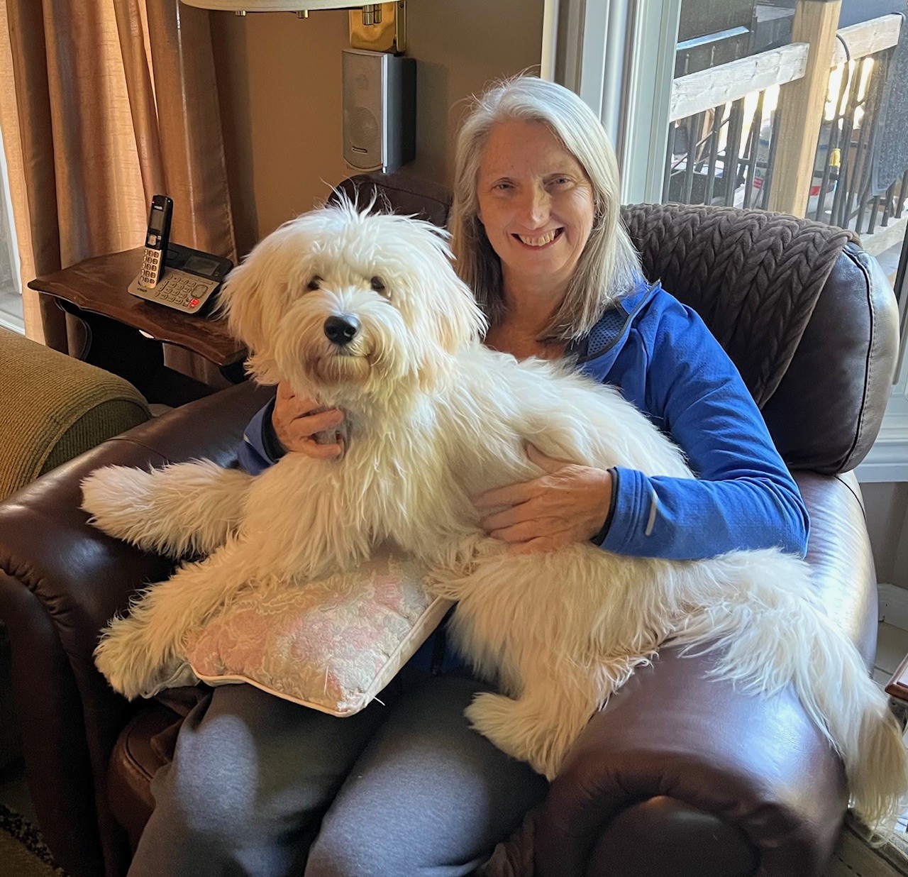 Kathy Wilson with her dog Willy, recovering at home following a kidney transplant