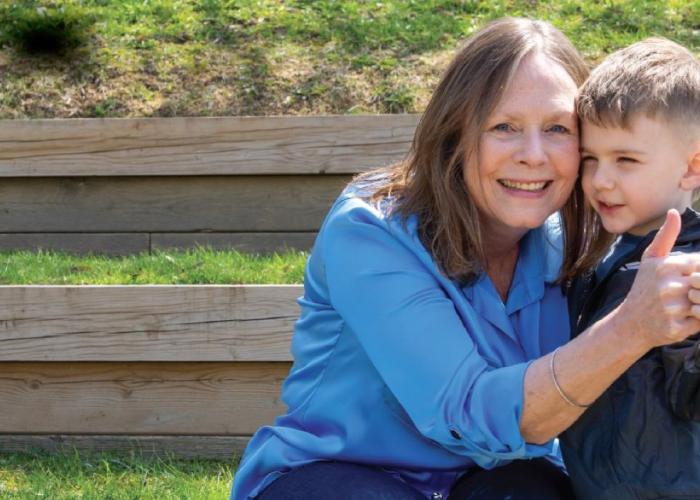 grateful patient Lori with her grandson