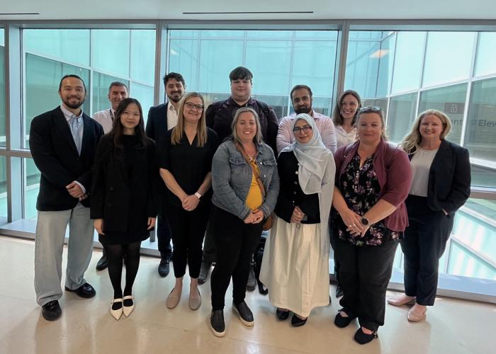 CMH stands with other participants at the Scale AI initiative