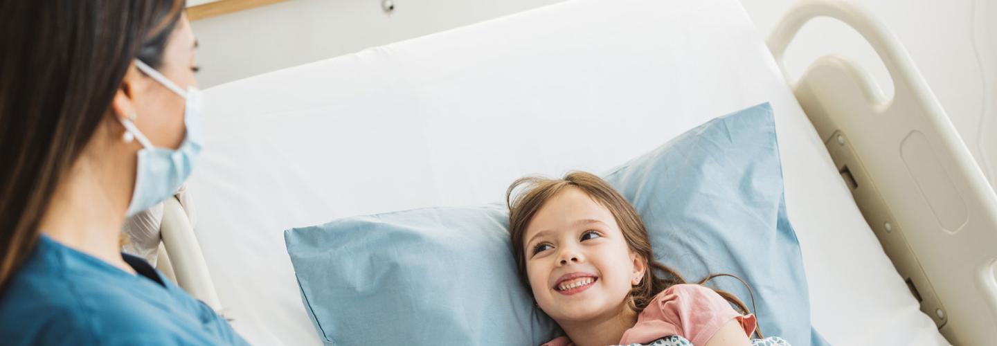 Little girl in hospital bed